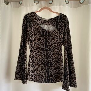 Blouse with cut out on chest and bell sleeves